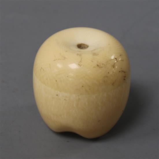 A Japanese ivory model of a fruit, with screw top